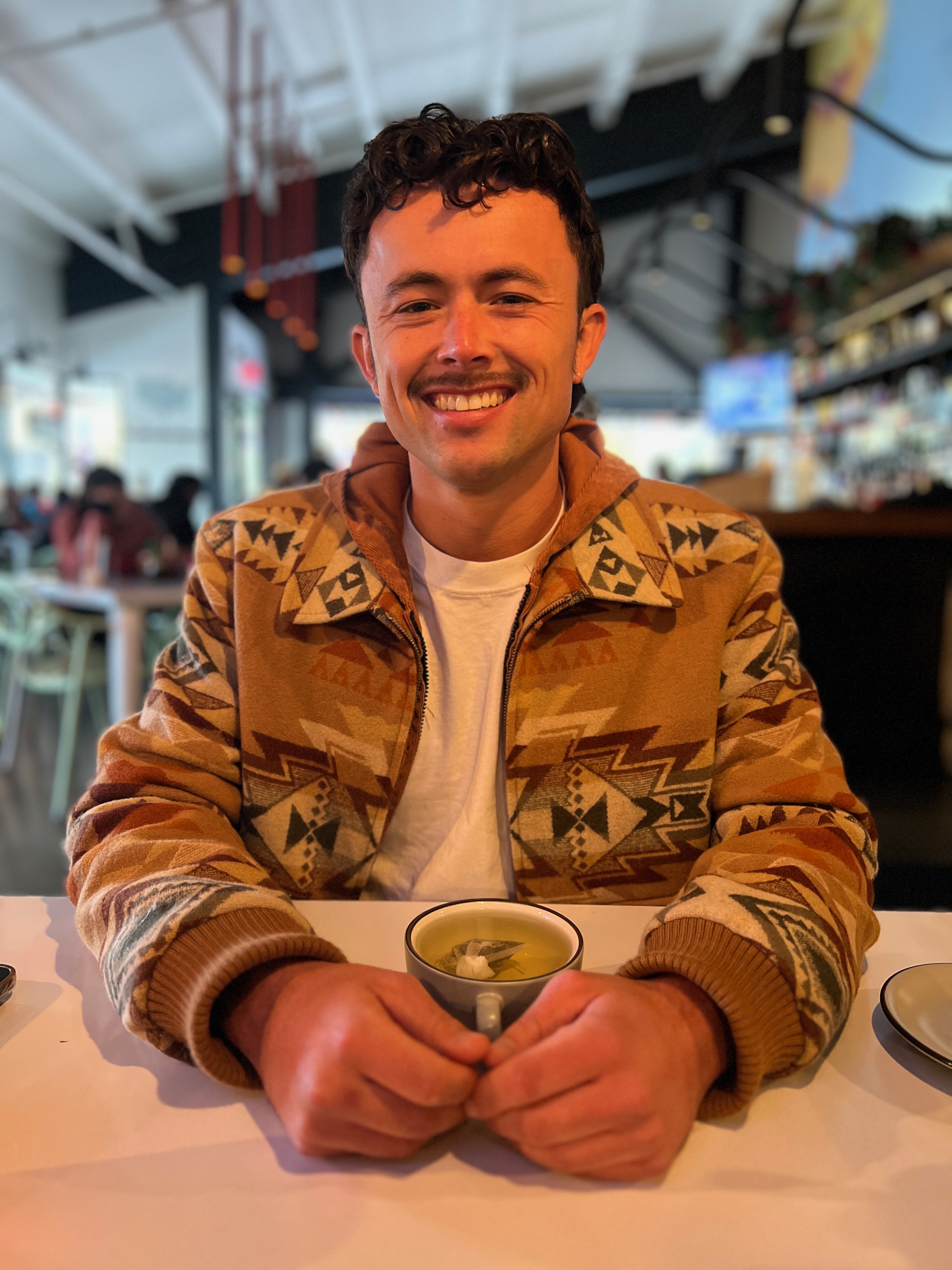 Juan Pablo Zamanillo smiling at the camera.